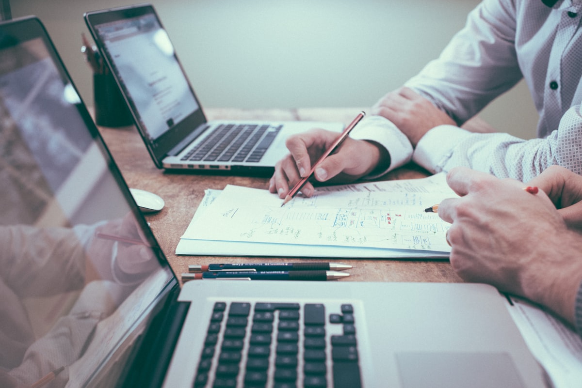 Financial planning with charts on paper